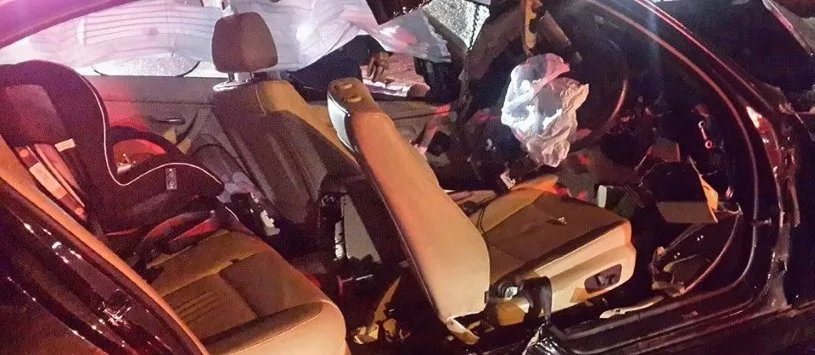 Child safely secured in child seat