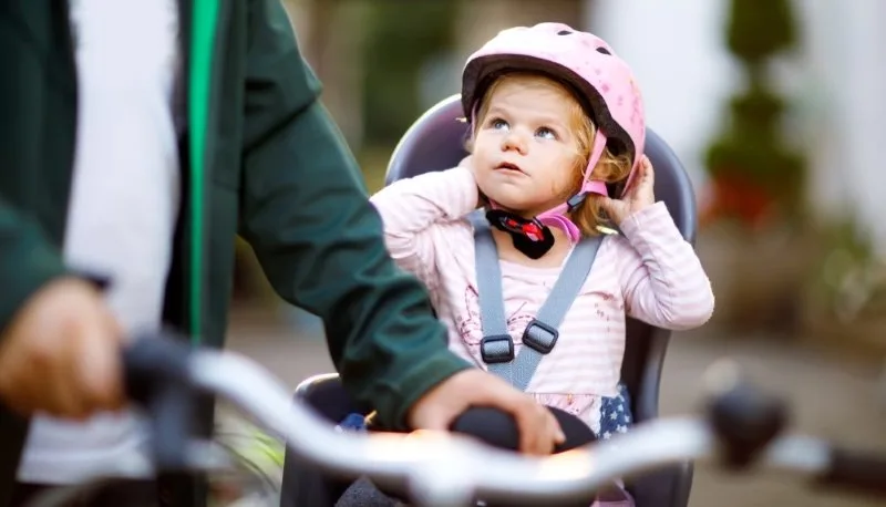 Сute baby riding a bike